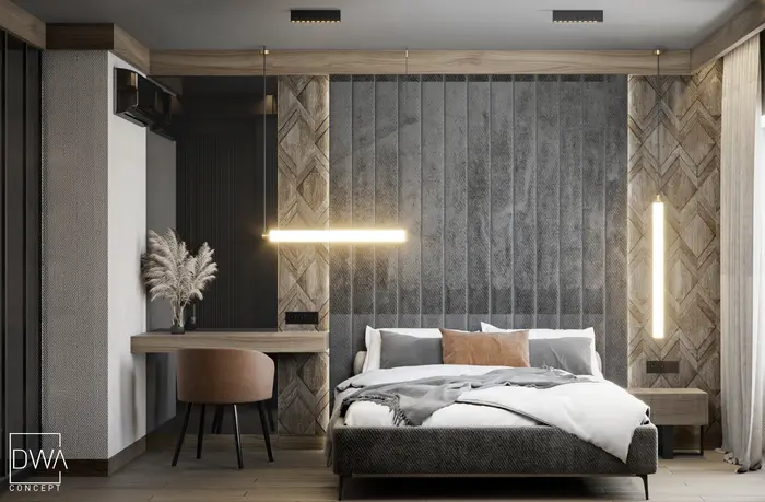 Sypialnia z kamiennym panelem, biurkiem i designerskim oświetleniem w ciepłej tonacji - apartament w Kościelisku