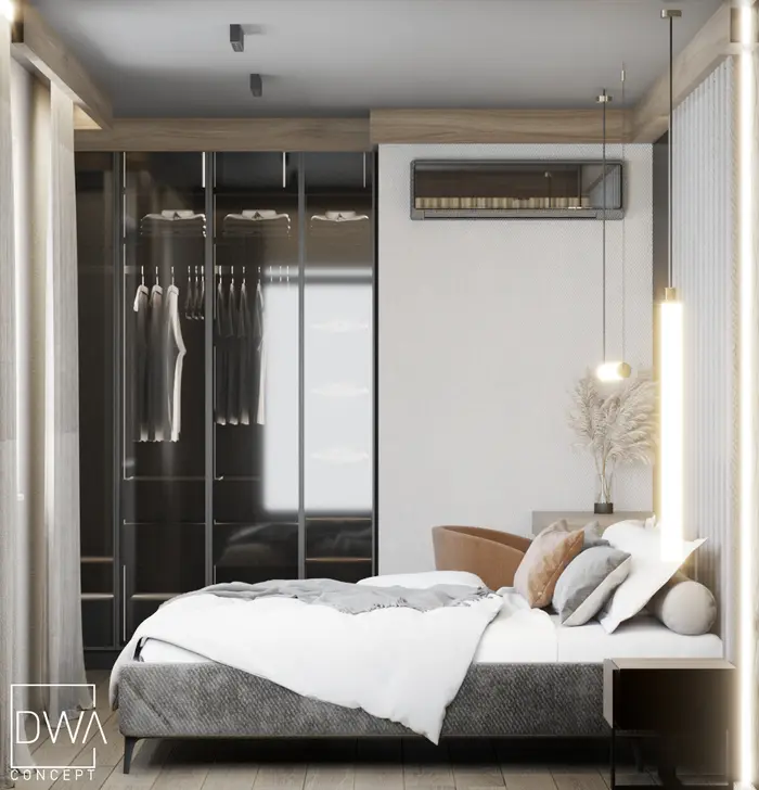 Sypialnia z garderobą za szklanymi drzwiami i kamienną ścianą przy łóżku - apartament w Kościelisku