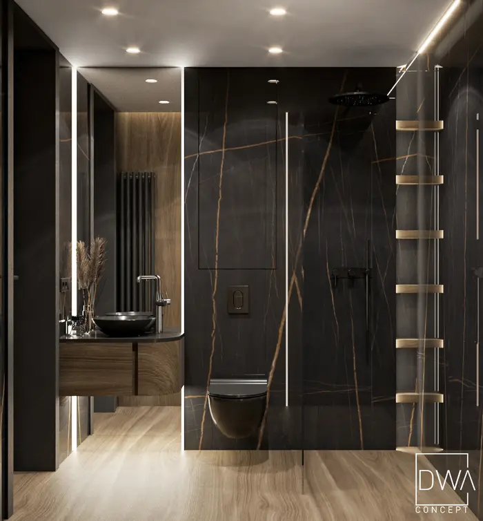 Łazienka wykończona spiekiem z czarną umywalką i złotą baterią - apartament w Kościelisku