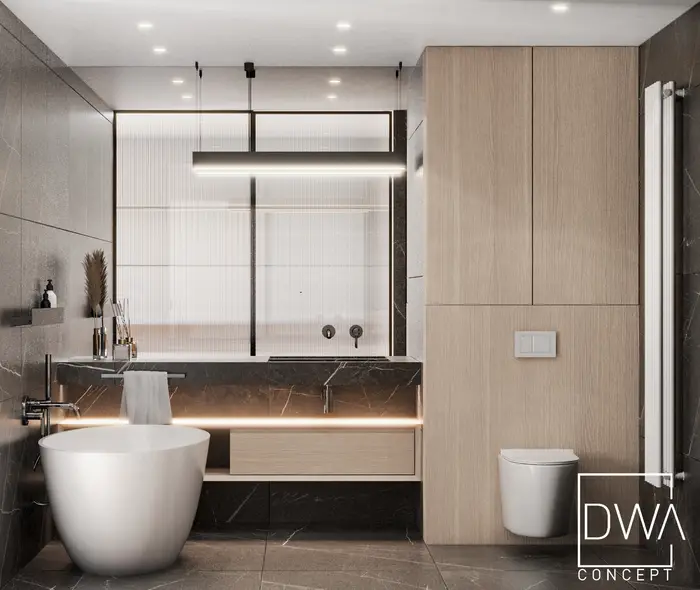 Łazienka wykończona spiekiem z wolnostojącą wanną i czarną umywalką - apartament w Krakowie