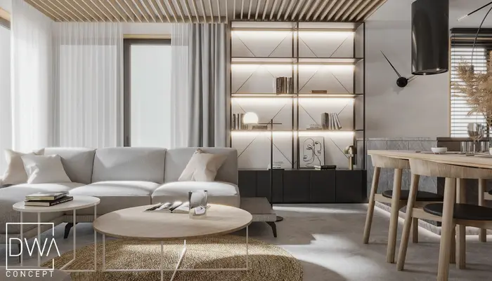 Salon z podświetlanym regałem, fotelami i stolikami kawowymi - apartament w Bielsku-Białej